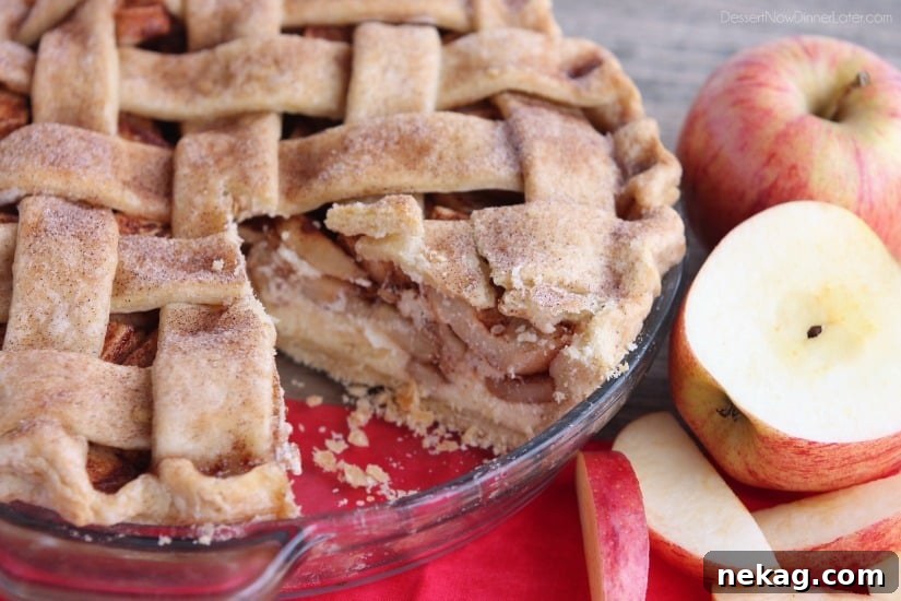 Spiced Apple Cheesecake Dream 5 A whole Apple Cheesecake Pie with a perfect cinnamon-sugar lattice top