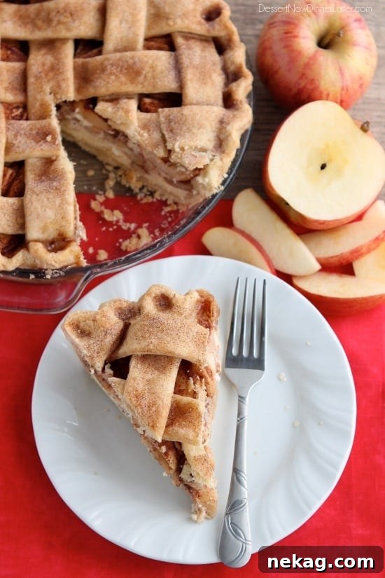 Spiced Apple Cheesecake Dream 6 A slice of Apple Cheesecake Pie on a plate, ready to be enjoyed