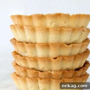 Nutty Almond Tart Foundation 2 A perfectly baked almond flour tart crust, golden brown and ready for filling.