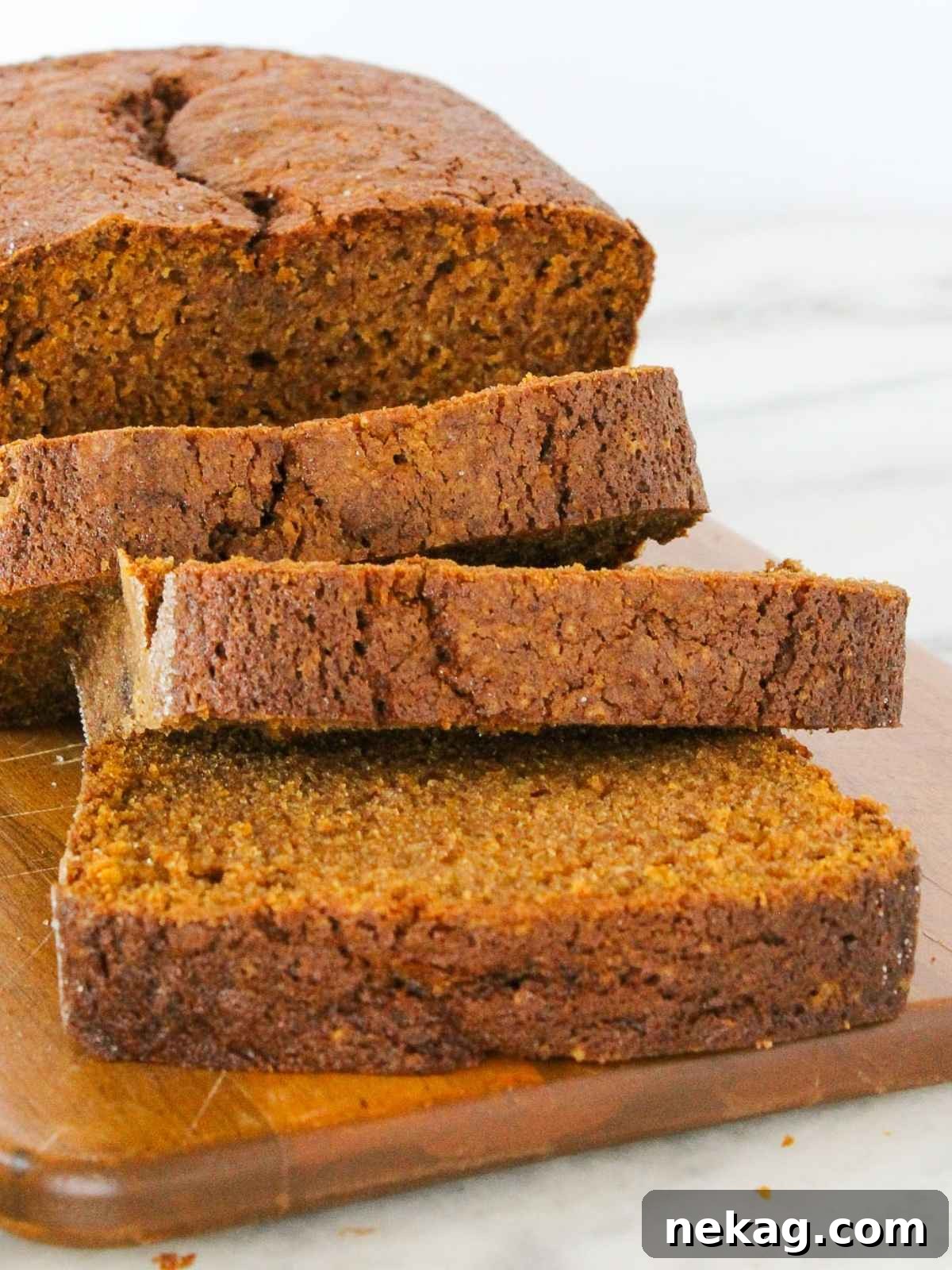 Spiced Pumpkin Delight 11 A close-up view of freshly sliced pumpkin bread, showing the moist, tender texture and perfect crumb.