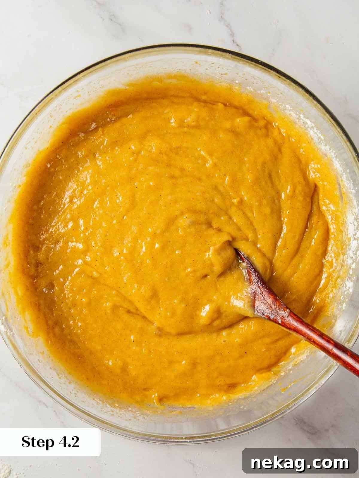 Spiced Pumpkin Delight 10 Smooth and creamy pumpkin bread batter ready for baking.