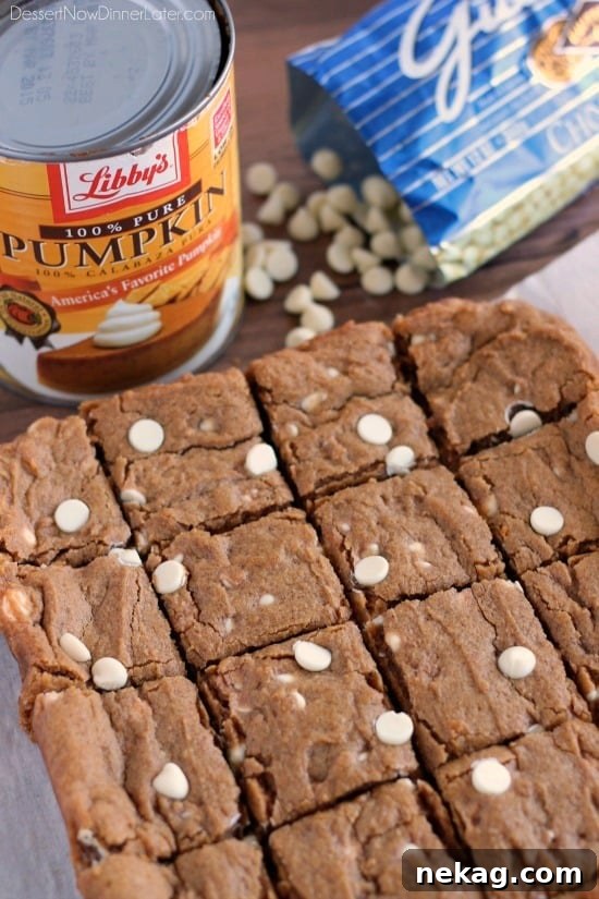 Autumn Spice Pumpkin White Chocolate Blondies 3 Delicious Pumpkin White Chocolate Chip Blondies, a perfect fall treat.