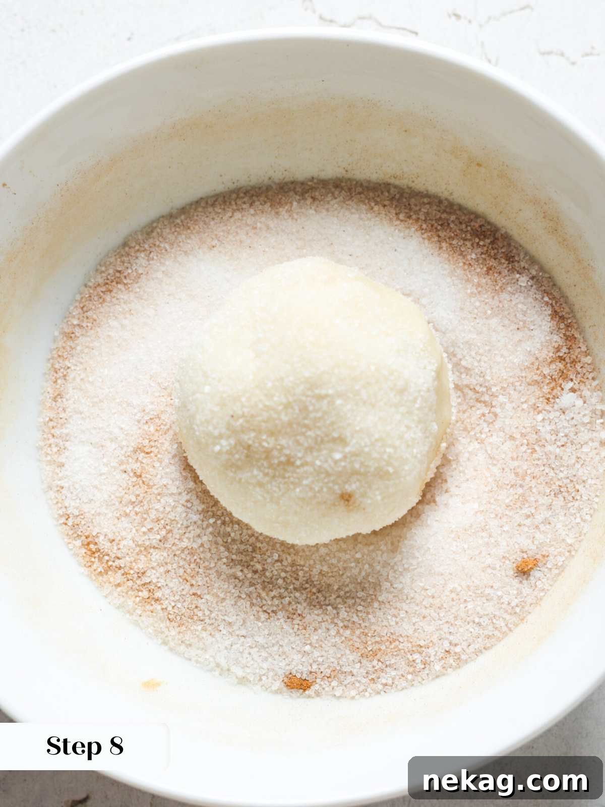 Irresistible Snickerdoodle Delights 9 snickerdoodle cookie dough ball rolled in cinnamon sugar.