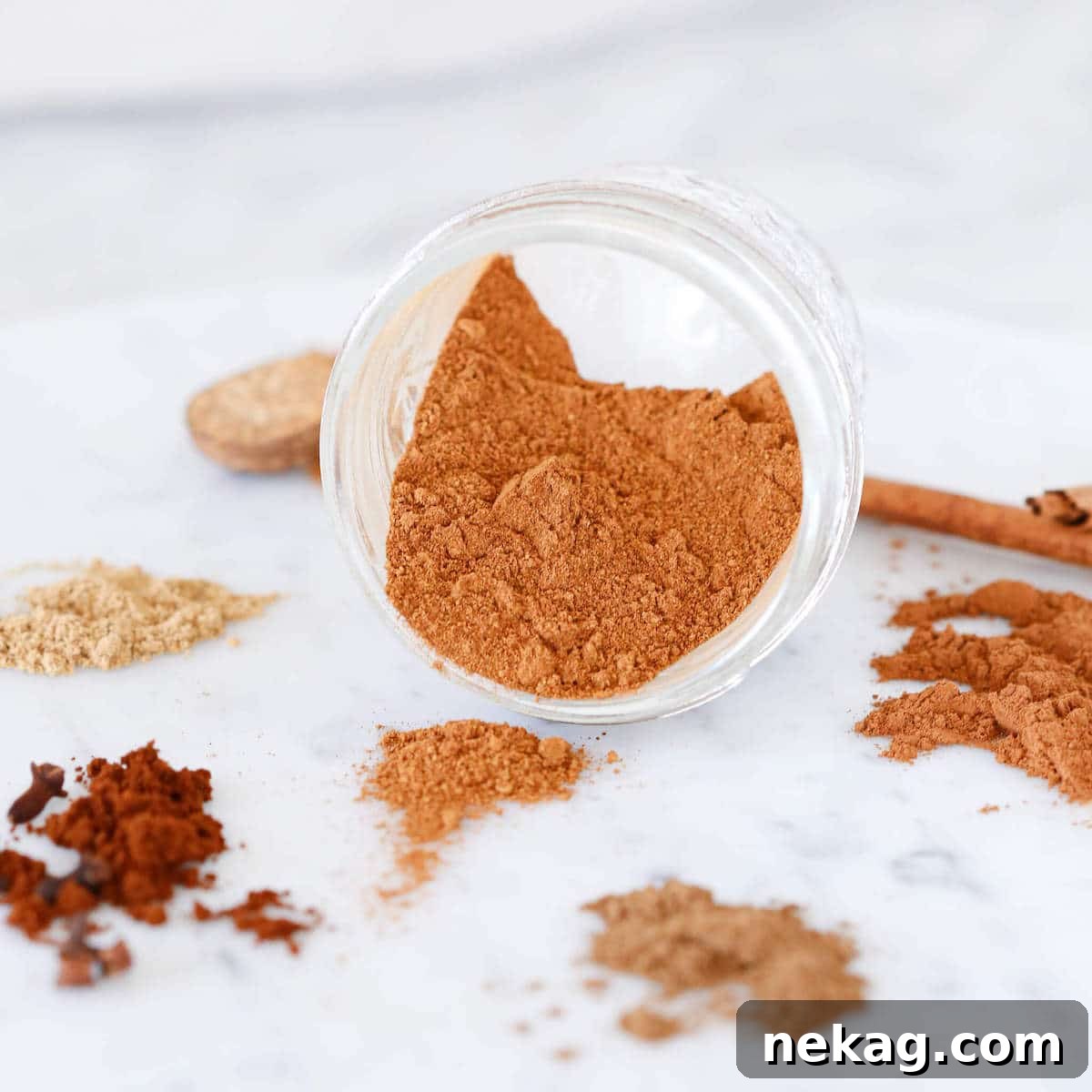 Pumpkin Spice Delights 6 Assorted pumpkin spices laid out on a elegant marble surface, ready for blending or use.