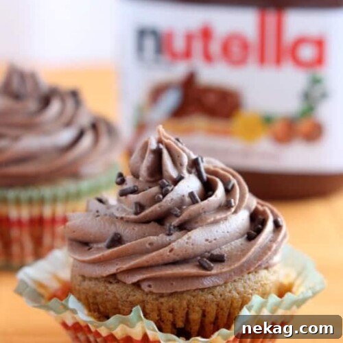 Delicious Pumpkin Cupcakes with Nutella Frosting