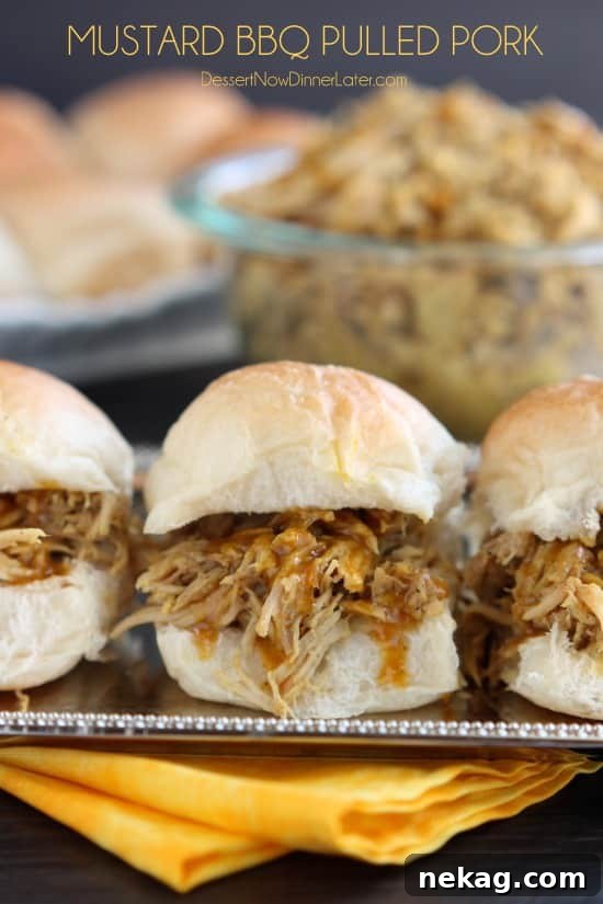 Carolina Gold Pulled Pork 2 Tender, shredded mustard BBQ pulled pork piled high on a bun