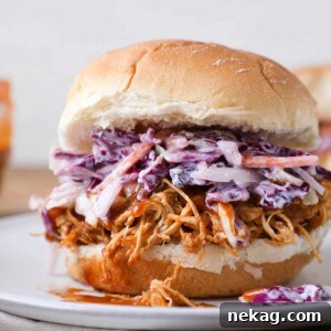 Slow cooker barbecue pulled chicken sandwich with cole slaw