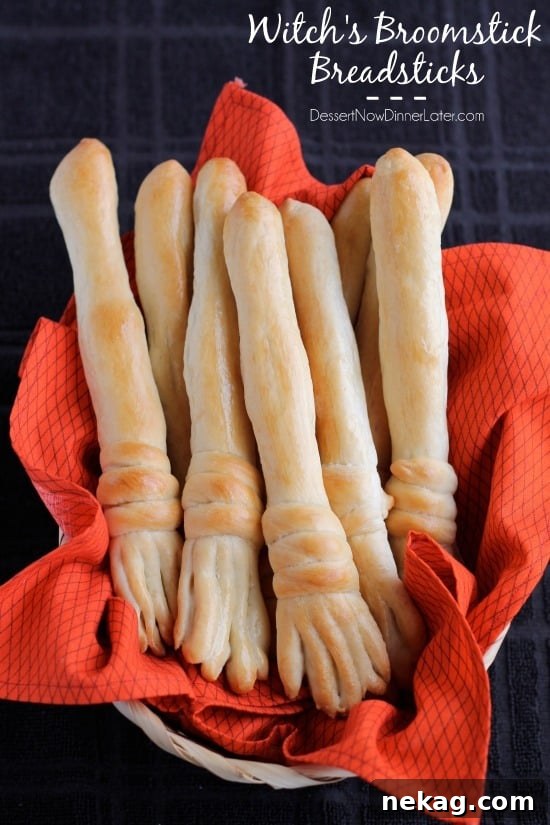 A close-up shot of Witch's Broomstick Breadsticks, showing the detailed bristle ends and handles, ready to be dipped.