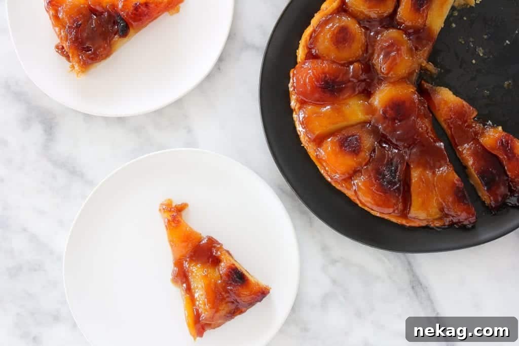 Golden Caramel Apple Delight 2 This Apple Tarte Tatin is what Francophile dreams are made of! It has buttery puff pastry cooked to perfection, deep caramelized apples, and is flambéed just because!