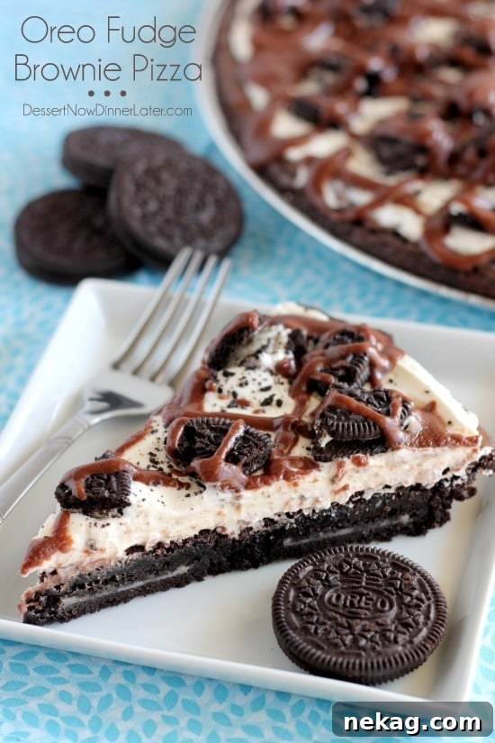 Fudgy Cookies and Cream Brownies 14 Oreo Fudge Brownie Pizza – These brownies are for the Oreo lovers! There are plenty of Oreo’s inside and out of this dessert pizza, topped with a marshmallow fluff frosting and drizzled in fudge sauce. From DessertNowDinnerLater.com