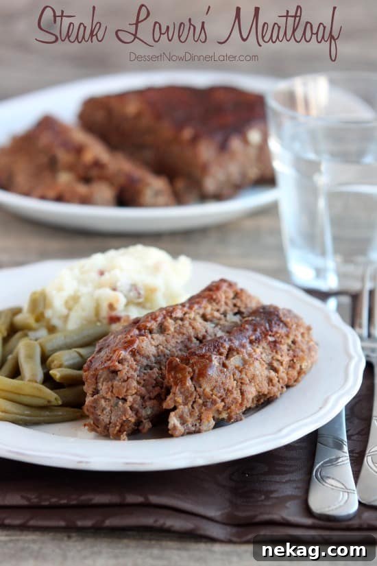 Gourmet Steak Meatloaf 2 Steak Lovers' Meatloaf - A1 steak sauce, garlic, and onions on the inside, with more steak sauce slathered on the outside, makes this meatloaf both moist and delicious! From DessertNowDinnerLater.com