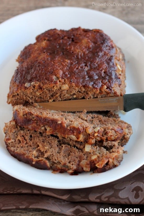 Gourmet Steak Meatloaf 3 Steak Lovers' Meatloaf - A1 steak sauce, garlic, and onions on the inside, with more steak sauce slathered on the outside, makes this meatloaf both moist and delicious! From DessertNowDinnerLater.com
