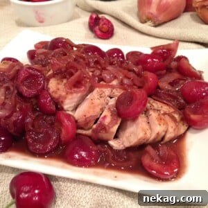 Delicious Chicken in Cherry Wine Sauce served on a white plate