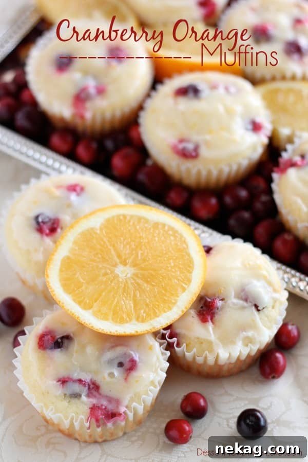 Delightful homemade Cranberry Orange Muffins, bursting with fresh cranberries and zesty orange flavor, finished with a sweet orange glaze. Perfect for breakfast or brunch!