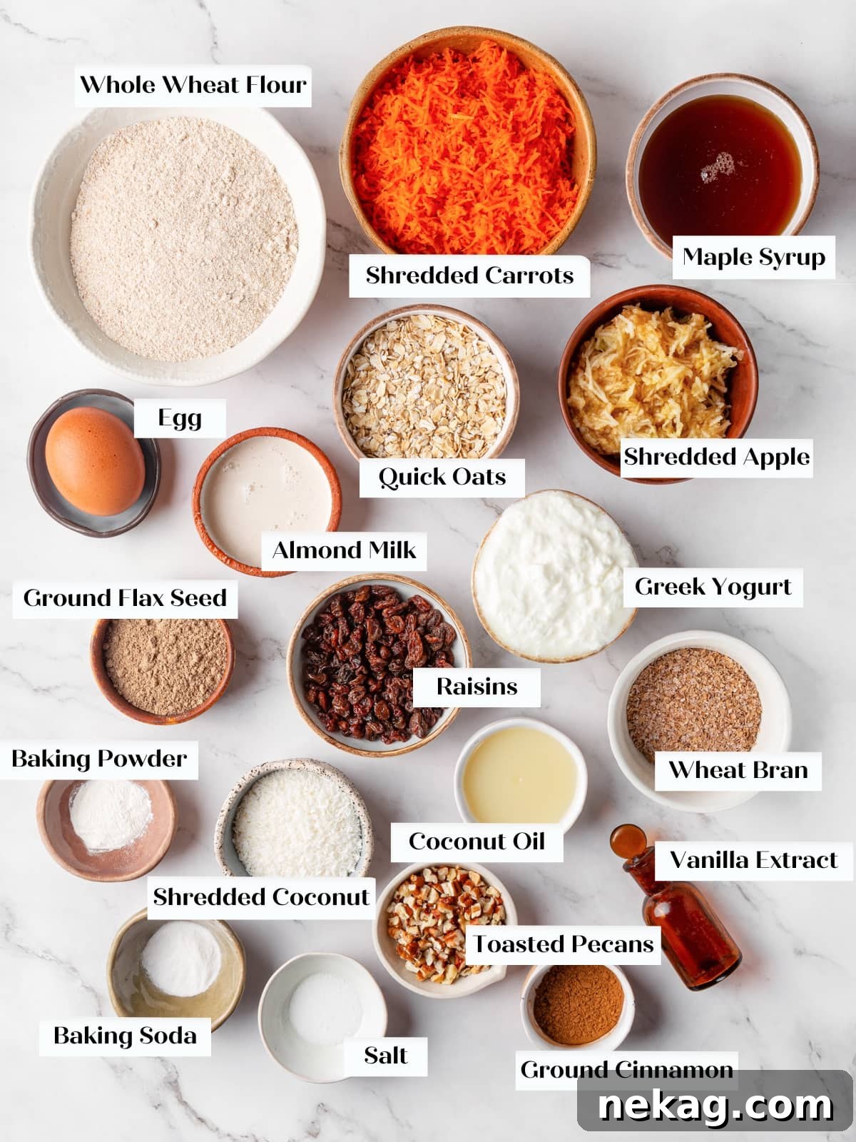 All the fresh and dry ingredients for morning glory muffins are meticulously laid out, ready for mixing and baking.