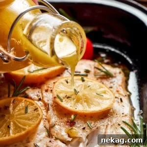 Champagne vinaigrette flowing from a bottle onto cooked fish for simple seasoning, highlighting its use beyond salads.