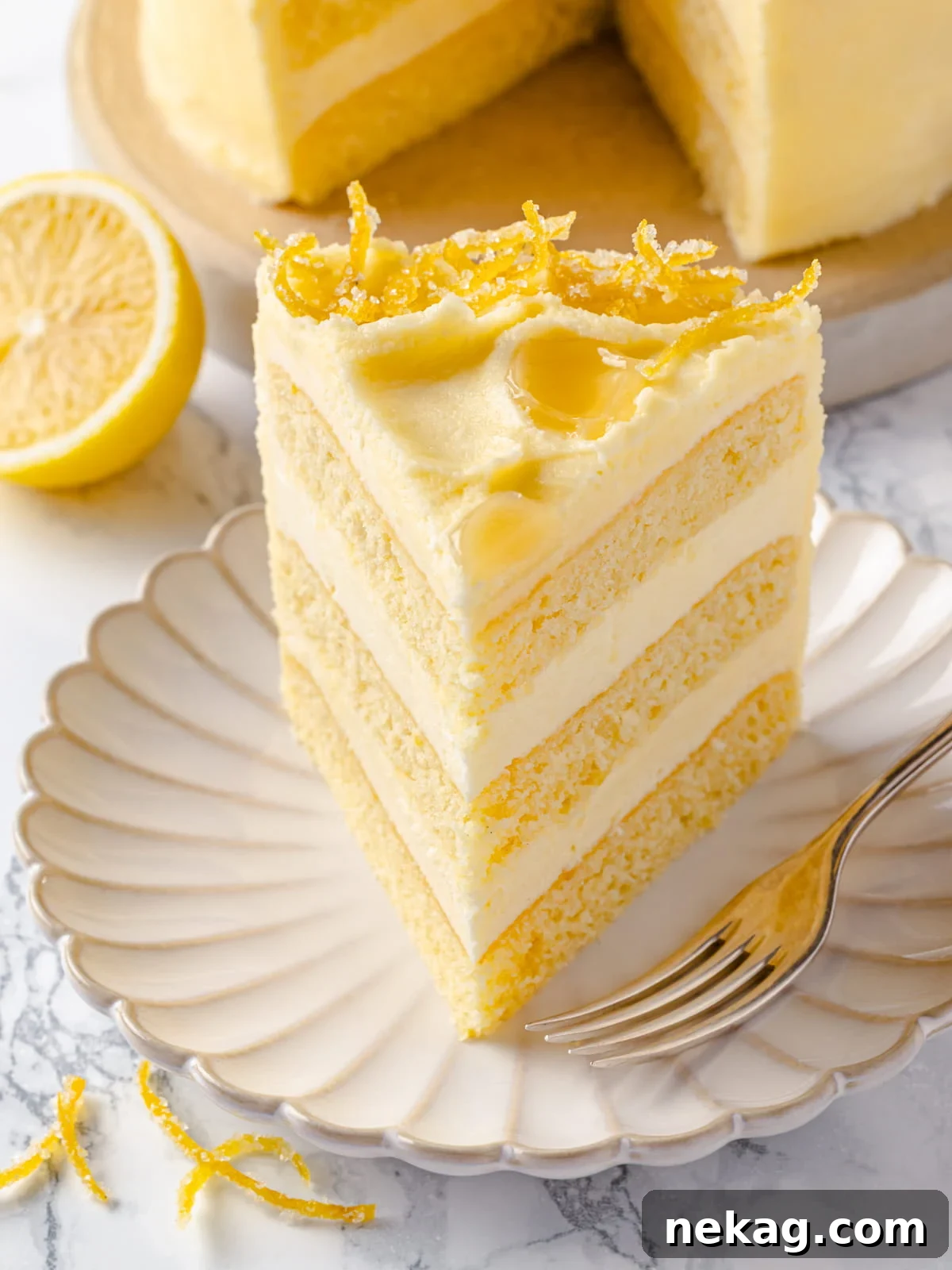 Zesty Lemon Delight Cake 26 Single slice of lemon cake with fluffy buttercream and tender crumb on display.
