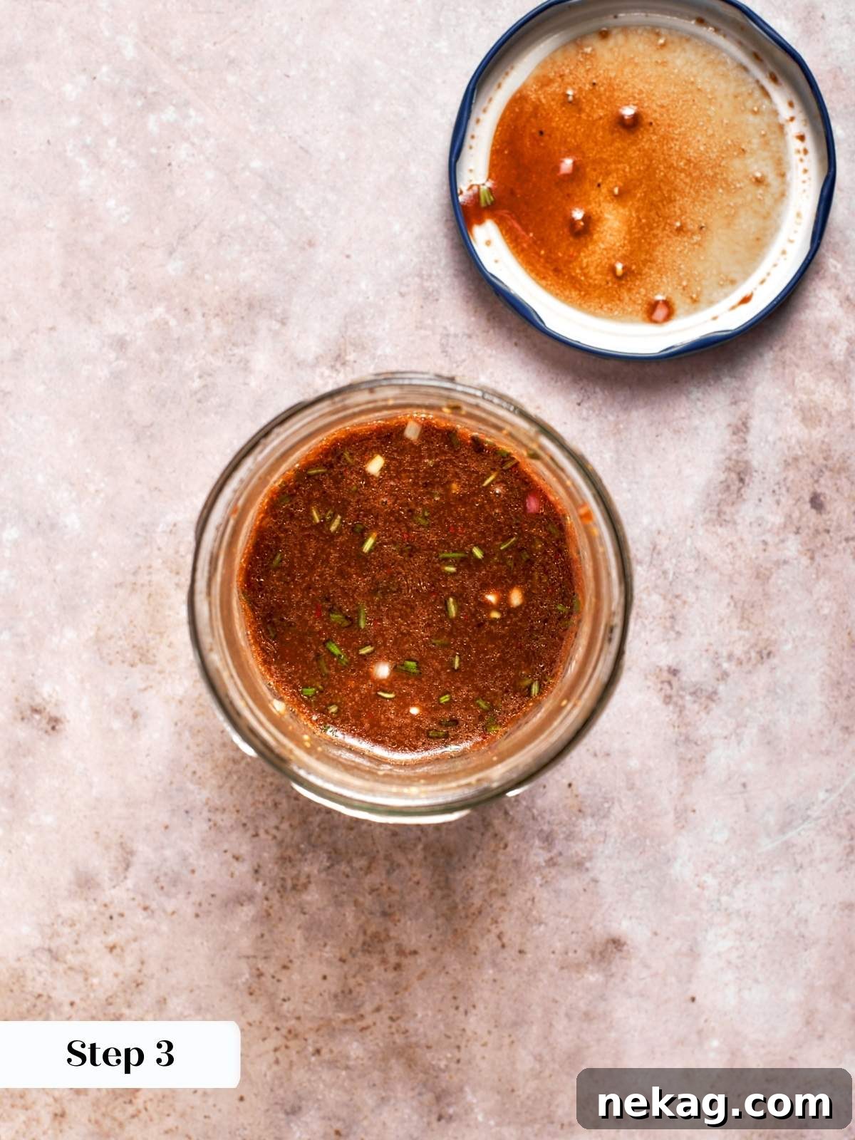 Fresh vinaigrette ingredients blended in mason jar until emulsified.