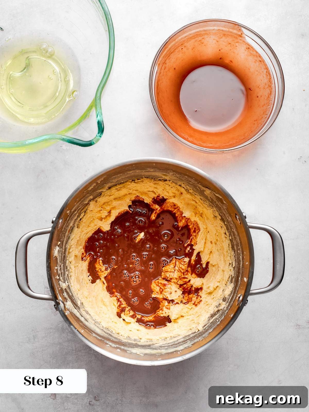 Melted German’s chocolate mixture poured into cake batter before mixing.