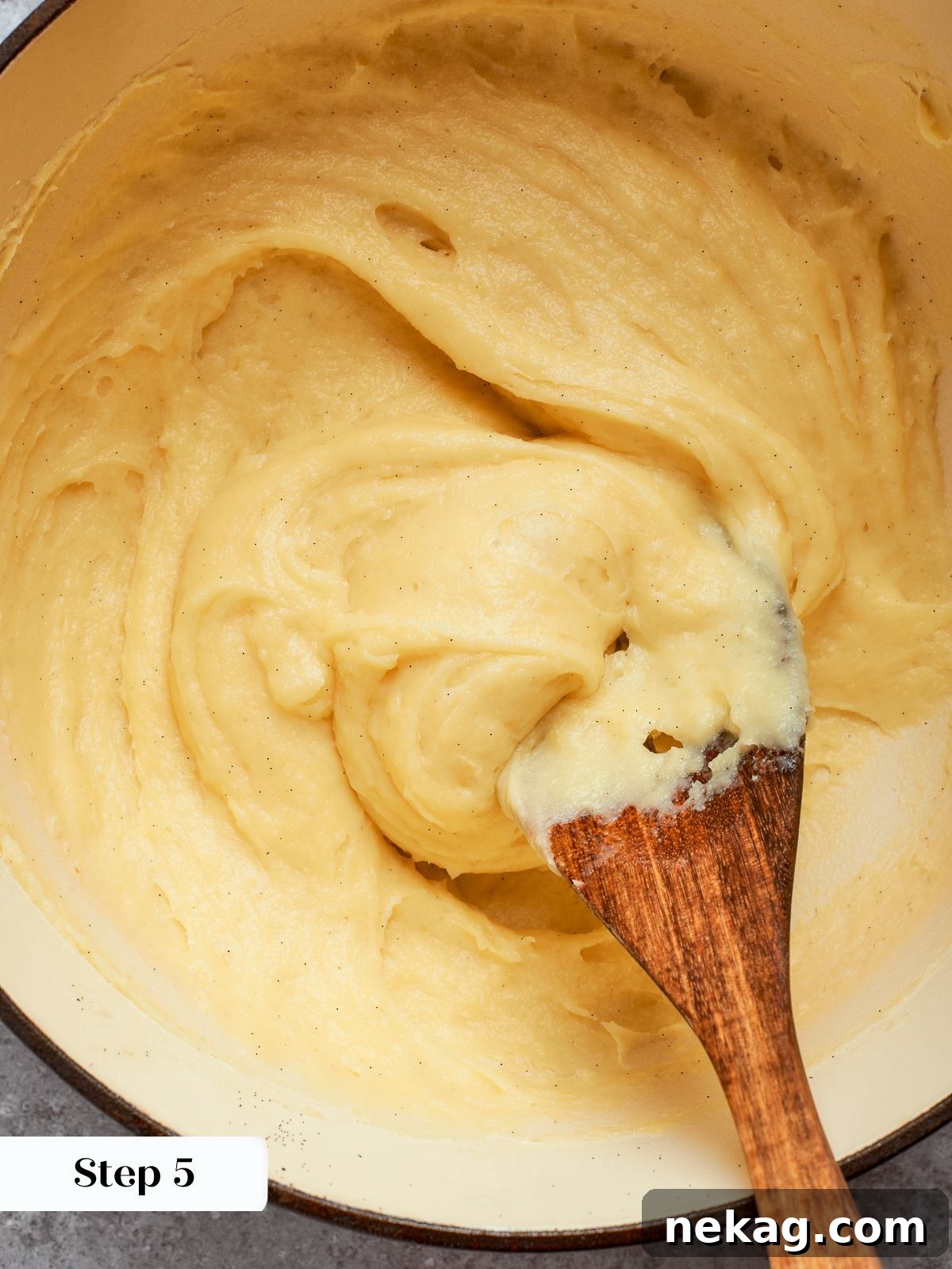 Sweet Puffs of Delight 12 Thickened pastry cream in pot after cooking, smooth and glossy from constant whisking.