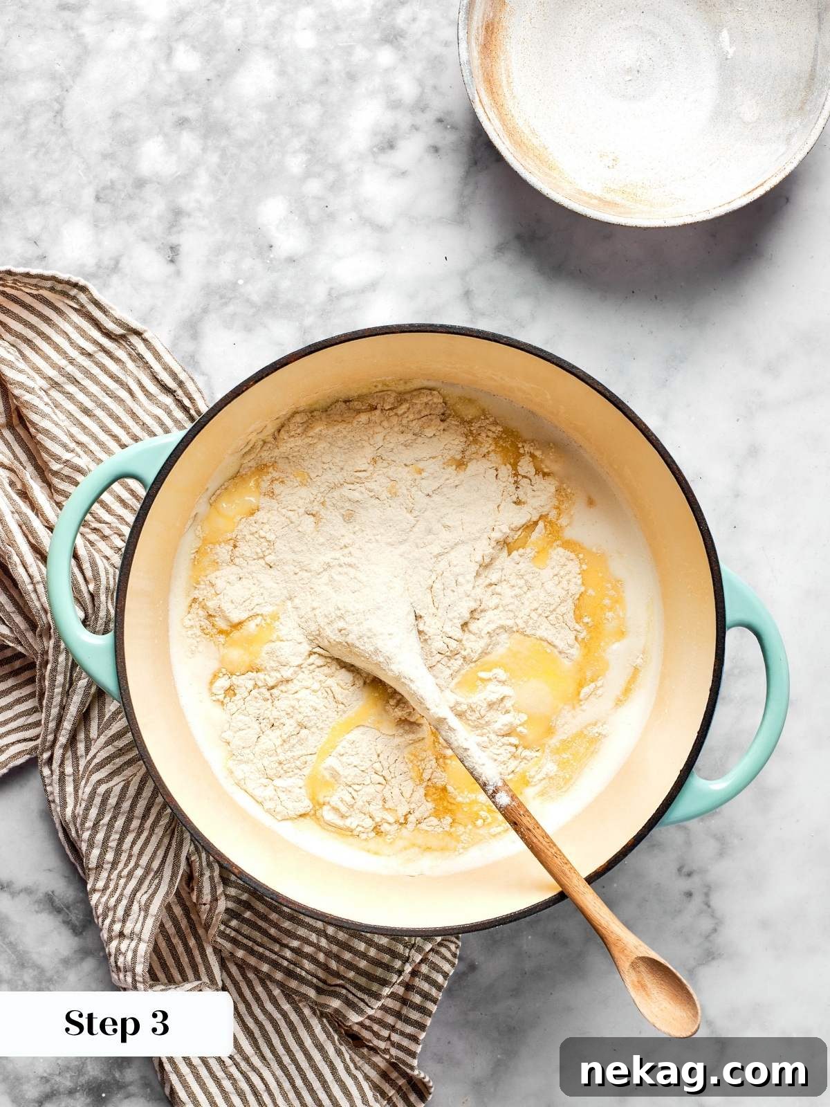 Sweet Puffs of Delight 17 adding flour to melted butter and milk in pot for choux paste.