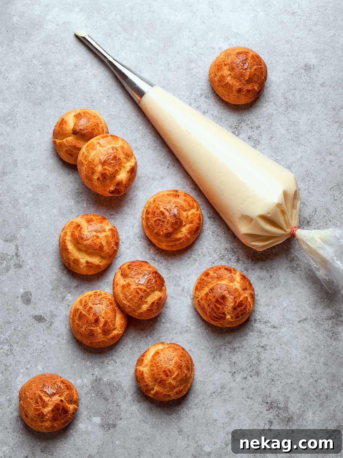 Sweet Puffs of Delight 32 Piping bag filled with smooth crème légère ready for filling pastries or desserts.
