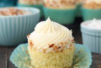 Moist Coconut Cupcakes with Creamy Coconut Frosting