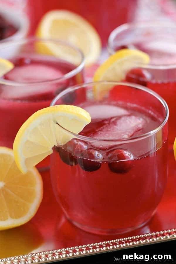 Sparkling Cranberry Punch Recipe for Parties and Holidays 4 Sparkling Cranberry Punch - the perfect beverage for a non-alcoholic party drink or mocktail with only 3 ingredients!