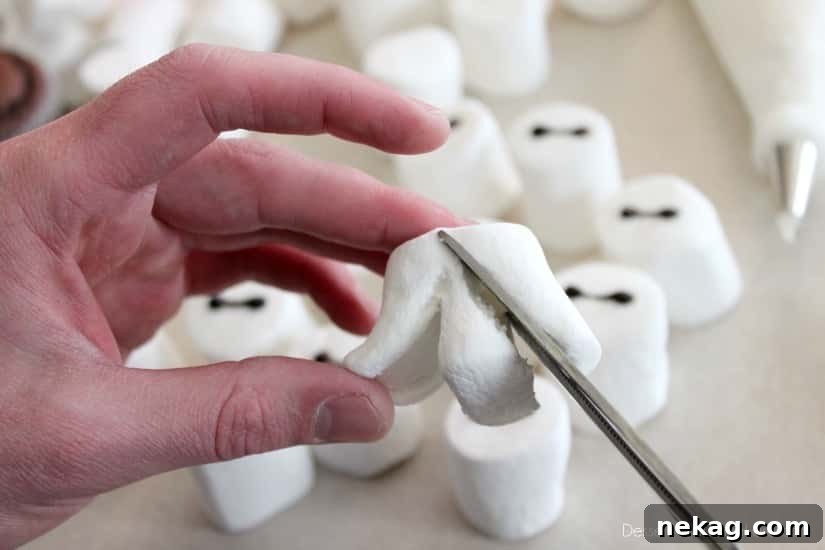Baymax Cupcakes: Big Hero 6-Themed Treats for Parties 10 Baymax Cupcake Tutorial {Big Hero 6}