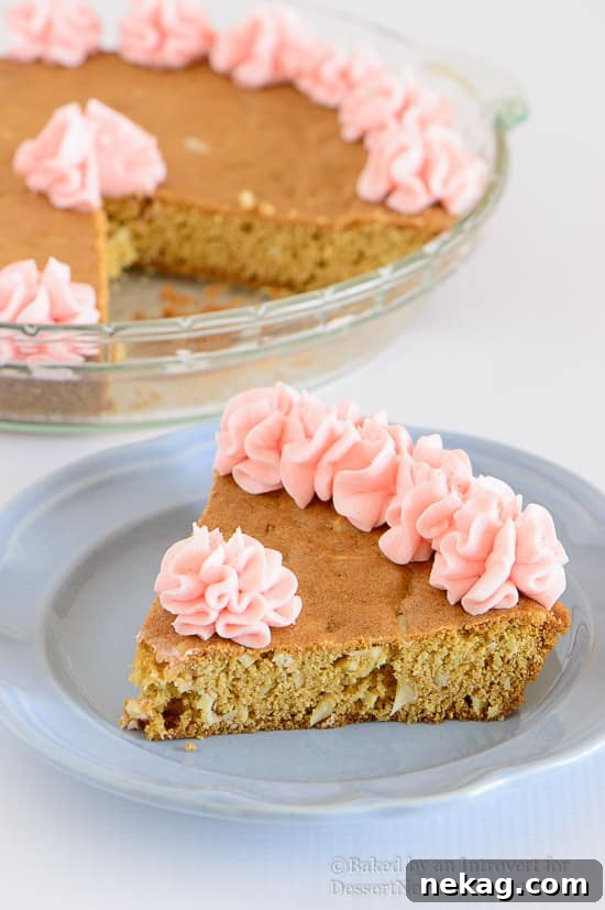 Almond Cherry Sugar Cookie Cake Recipe for Spring Gatherings 4 Almond Cherry Cookie Cake - Almond flavored sugar cookie cake with slivered almonds throughout and topped with cherry frosting. The best sugar cookie you will ever have!