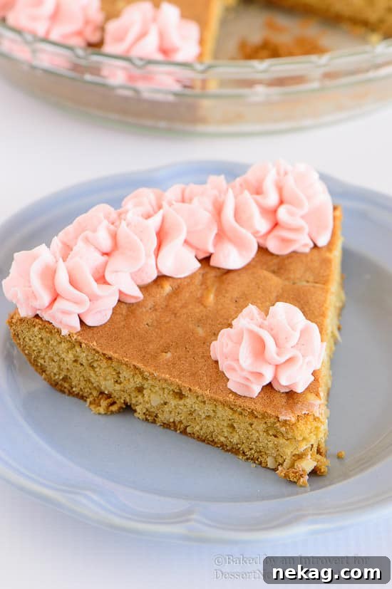 Almond Cherry Sugar Cookie Cake Recipe for Spring Gatherings 5 Almond Cherry Cookie Cake - Almond flavored sugar cookie cake with slivered almonds throughout and topped with cherry frosting. The best sugar cookie you will ever have!