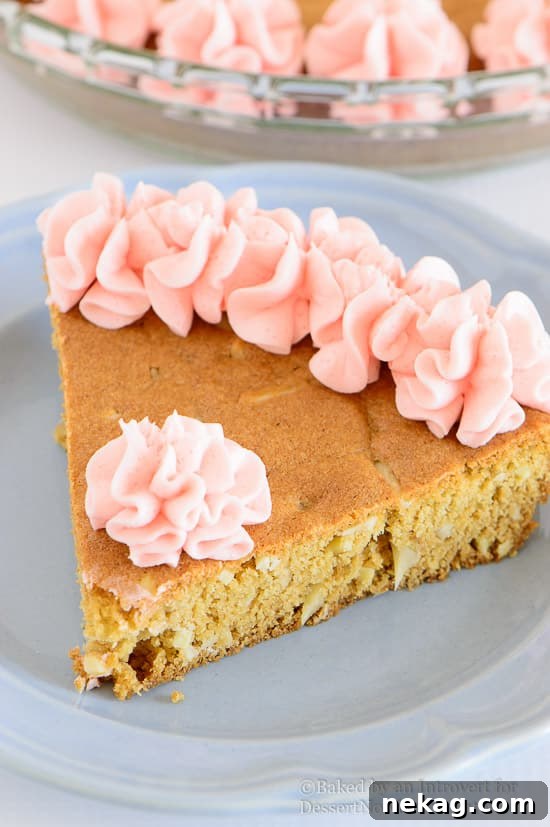 Almond Cherry Sugar Cookie Cake Recipe for Spring Gatherings 6 Almond Cherry Cookie Cake - Almond flavored sugar cookie cake with slivered almonds throughout and topped with cherry frosting. The best sugar cookie you will ever have!