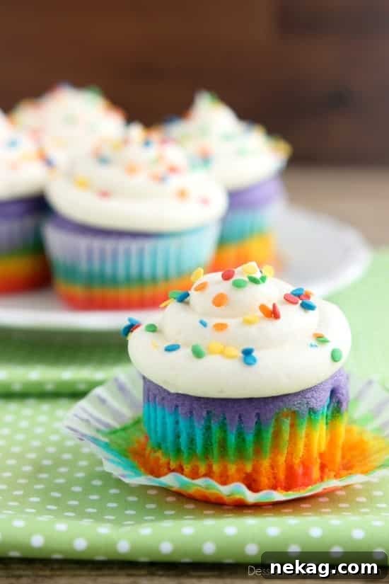 How to Make Colorful Rainbow Cupcakes (With Video Tutorial) 6 Tray of rainbow cupcakes