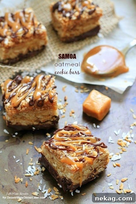 Samoa Oatmeal Cookie Bars - These soft oatmeal cookie bars combine the beloved caramel, chocolate and coconut flavors of the Samoa Girl Scout cookies.