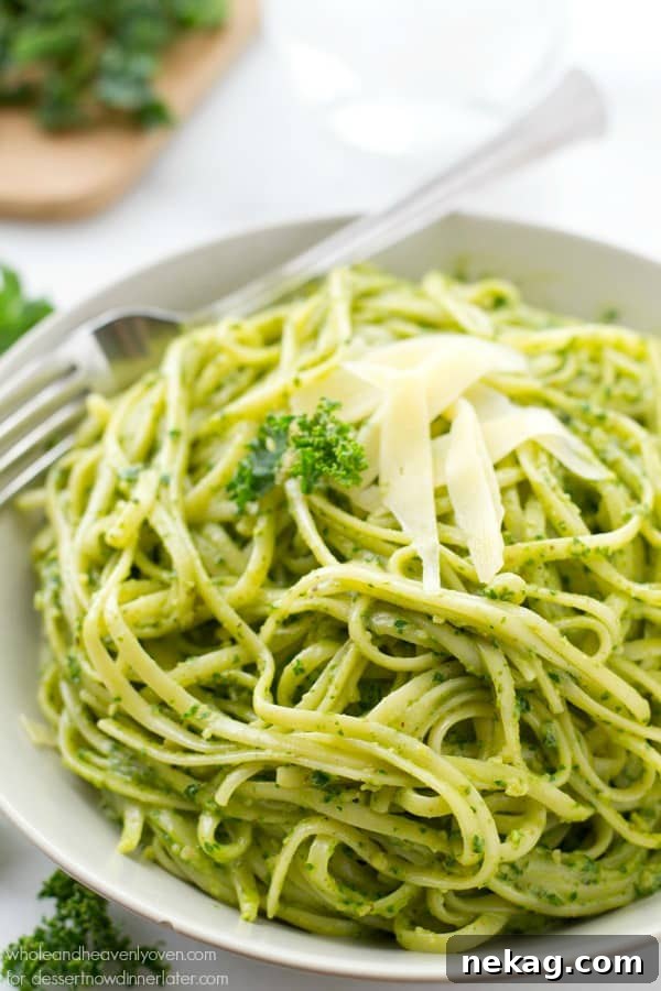 This creamy fettuccine combines the best worlds of both alfredo sauce and fresh pesto into one fresh springtime pasta side dish!