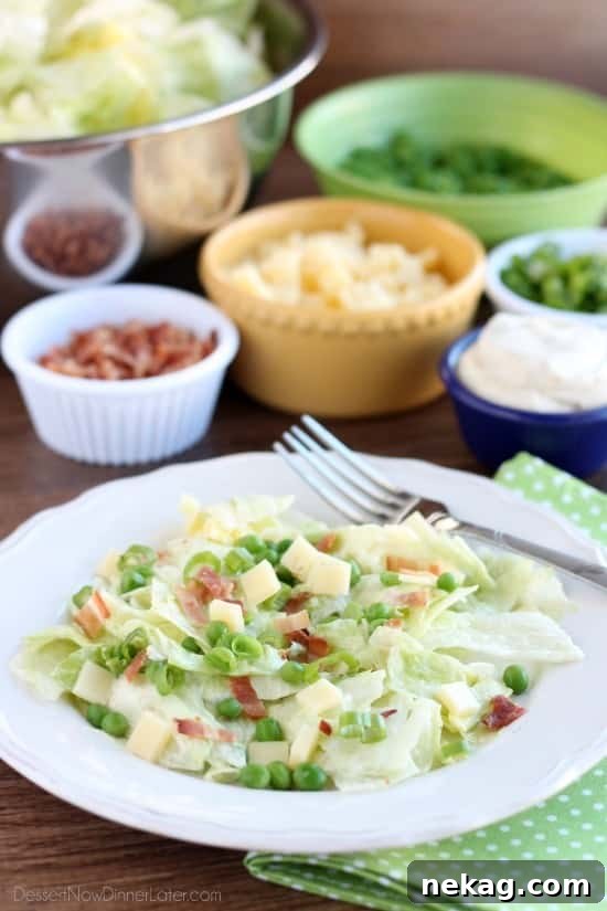 Sarah’s Salad Recipe from The Lion House: Utah Family Favorite 2 Sarah's Salad from Utah's Lion House restaurant uses crisp iceberg lettuce, peas, bacon, green onions, and swiss cheese tossed in a simple, sweet dressing.