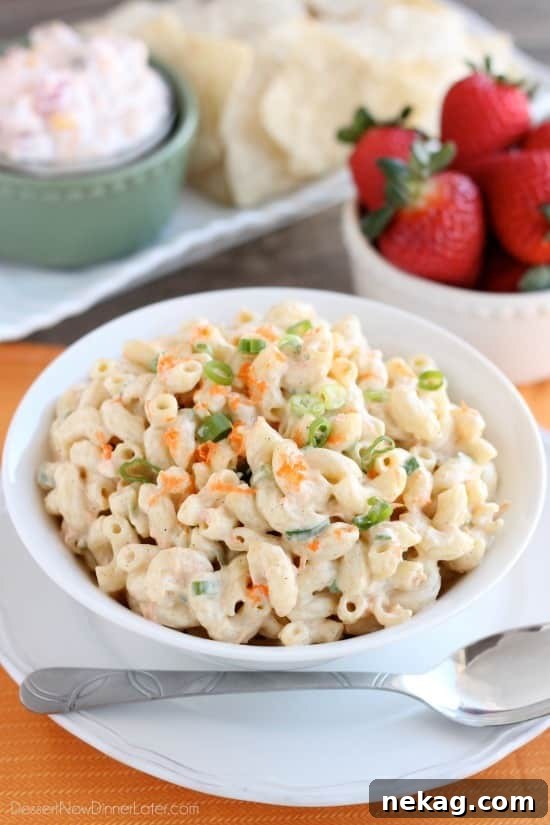 This Hawaiian-style macaroni salad is super creamy, lightly sweet, and truly the BEST macaroni salad out there! The perfect side dish for any party or potluck!