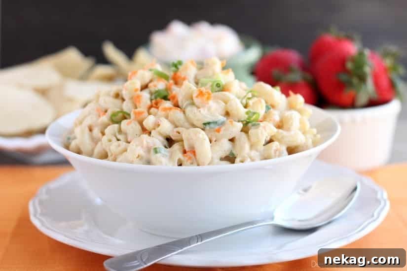 This Hawaiian-style macaroni salad is super creamy, lightly sweet, and truly the BEST macaroni salad out there! The perfect side dish for any party or potluck!