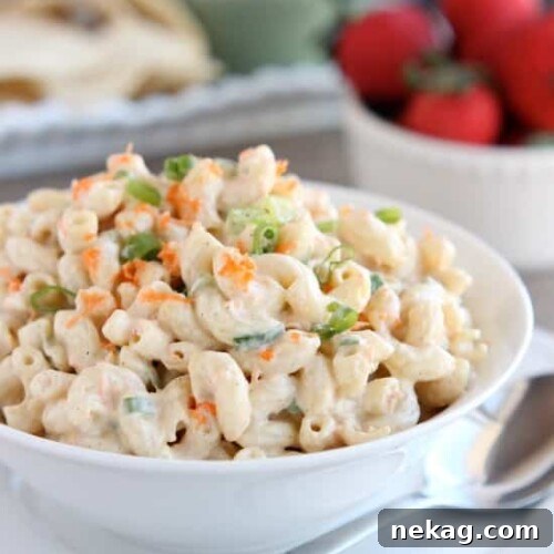 This Hawaiian-style macaroni salad is super creamy, lightly sweet, and truly the BEST macaroni salad out there! The perfect side dish for any party or potluck!