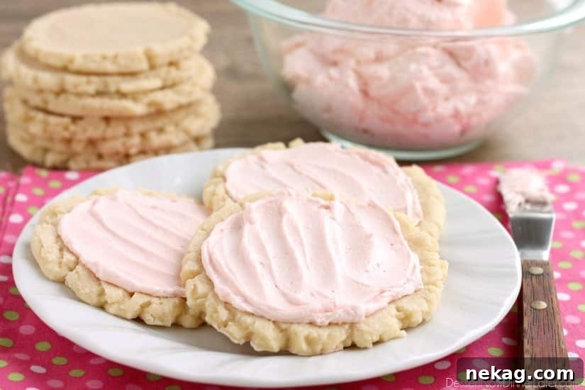 The ingredients list might surprise you with these scoop, press, and bake rustic-looking sugar cookies. With a soft, sweet, melt-in-your-mouth cookie base, topped with a smooth and dreamy buttercream frosting -- these really are the BEST sugar cookies you will make at home!