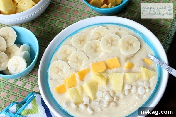 This tropical smoothie bowl is perfect for when you want the flavors of a smoothie but don't necessarily want to drink your breakfast. And the flavors will take you right to the beach!