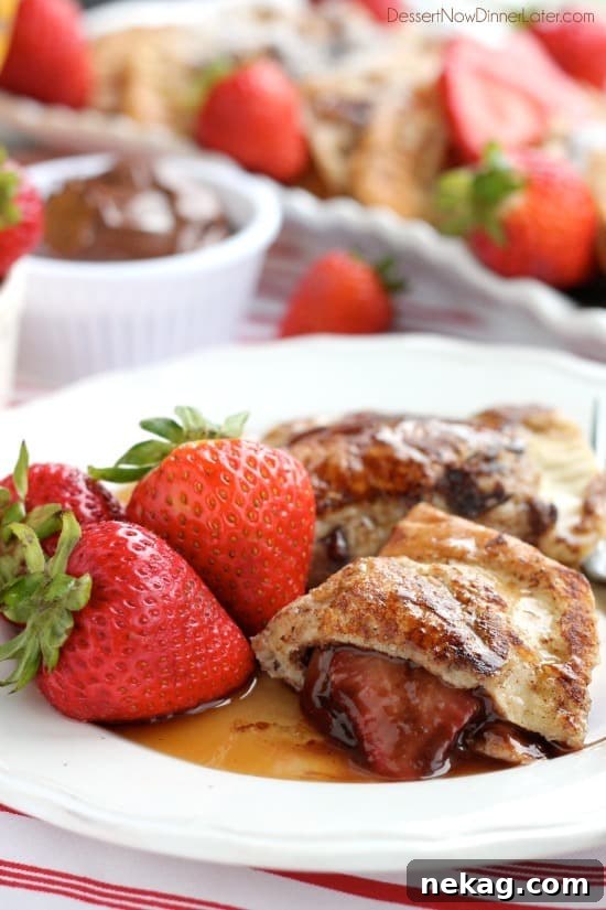 Fresh strawberries and Nutella are hidden inside this Stuffed French Toast recipe that's easy enough for the kids to help make!