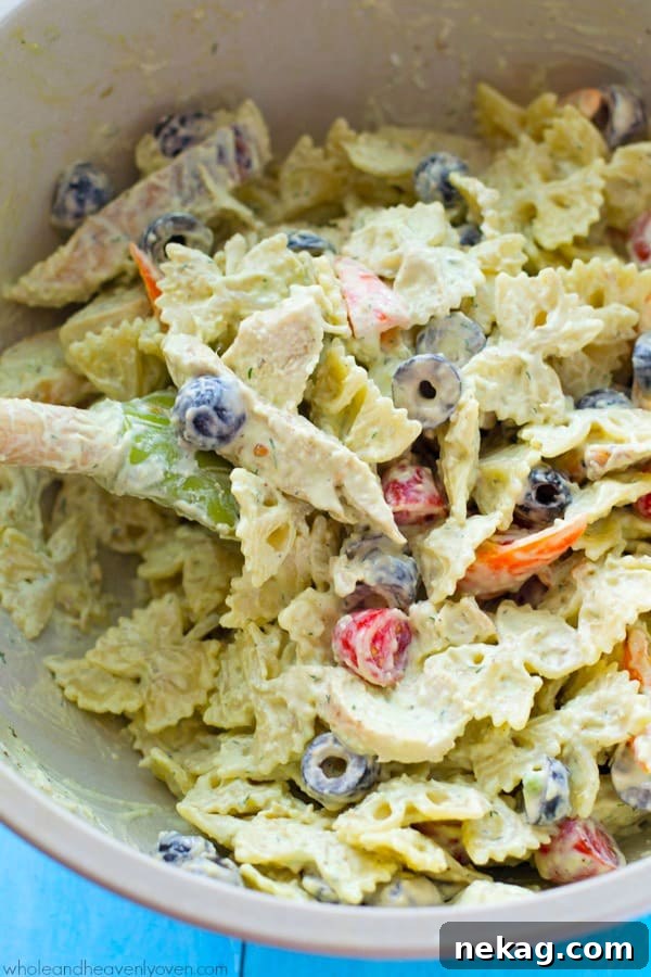This creamy pasta salad is jam-packed with juicy grilled chicken, a rainbow of colorful veggies, and a light, flavorful homemade avocado ranch dressing. Bring this salad to any picnic and watch it vanish!