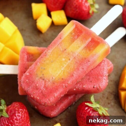 Strawberry Mango Chia Popsicles Recipe for Refreshing Summer Treats 5 Beat the summer heat with these Strawberry Mango Chia Popsicles! Fresh fruit, chia seeds, and coconut water is all you need to whip up these hydrating pops.