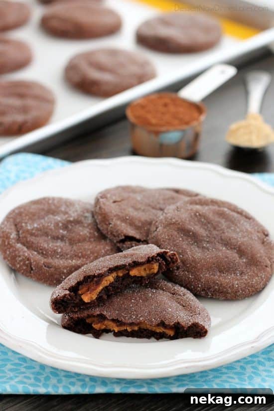 These Peanut Butter Stuffed Chocolate Cookies are soft and indulgent, but use peanut powder for less fat, without compromising taste!