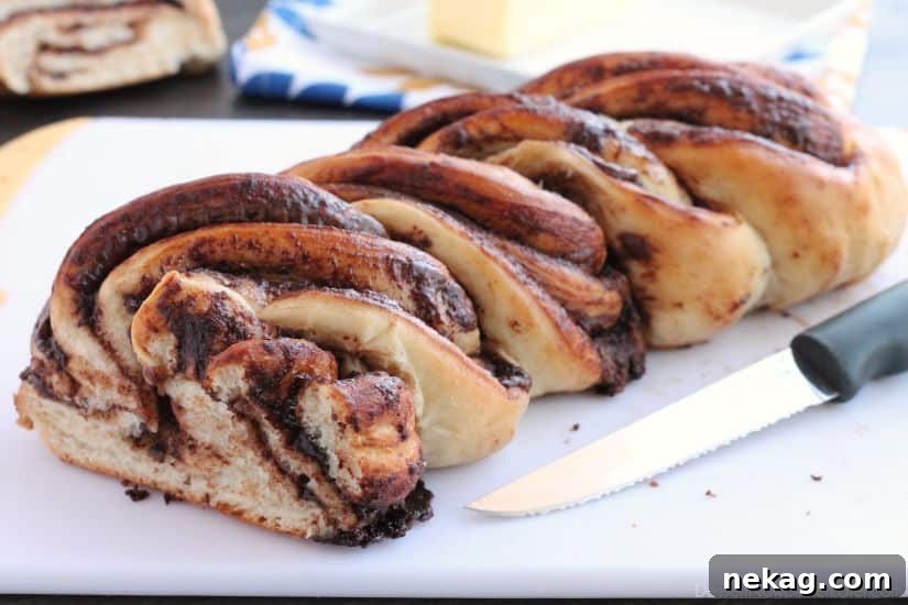 Finished Nutella twist loaf, golden and swirled with chocolate-hazelnut filling.