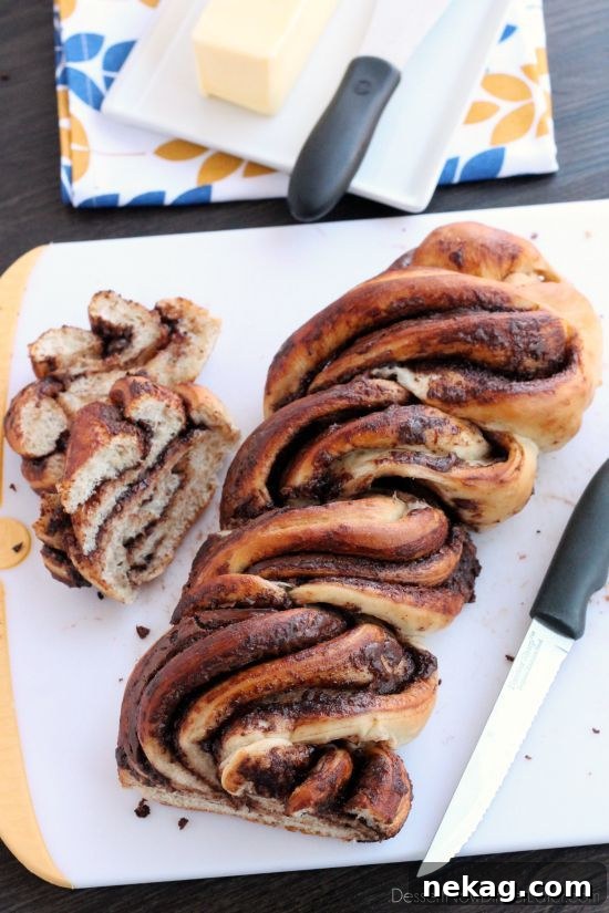 Slice of Nutella twist bread showing swirls of chocolate-hazelnut filling.