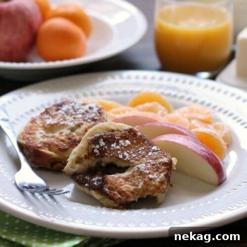 Decadent Chocolate-Stuffed French Toast Recipe 6 This Chocolate Stuffed French Toast is dipped in a sweet & buttery batter, then grilled until crisp on the outside and melty in the center. A perfect breakfast for the holidays or any time of year!
