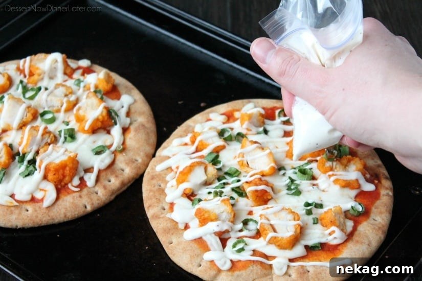 Farm Rich Boneless Buffalo Chicken Bites help make this flatbread pizza a quick and delicious game day snack!
