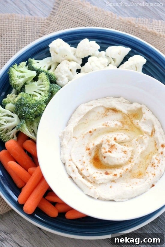 This low carb cauliflower hummus is smooth, creamy, and full of savory garlic flavor!